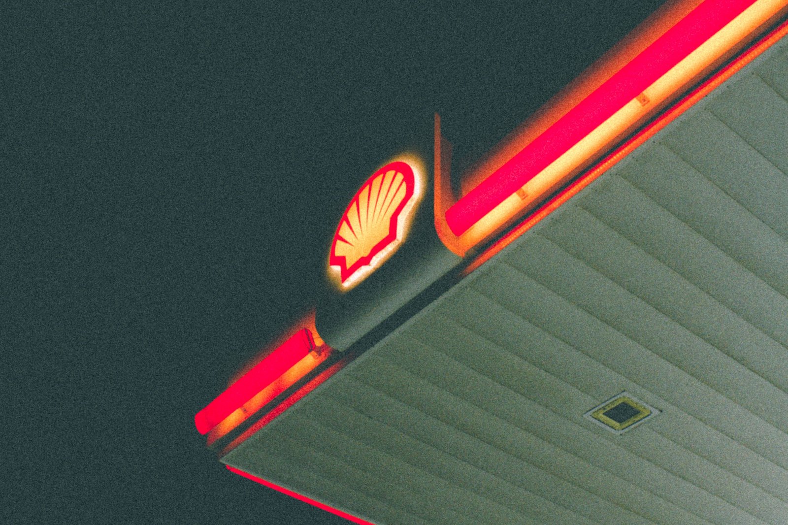 Illuminated fuel station canopy at night